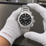 Casio EFR-S108D-1A held in white cotton gloves with Luxury Watches Malaysia cuff mark