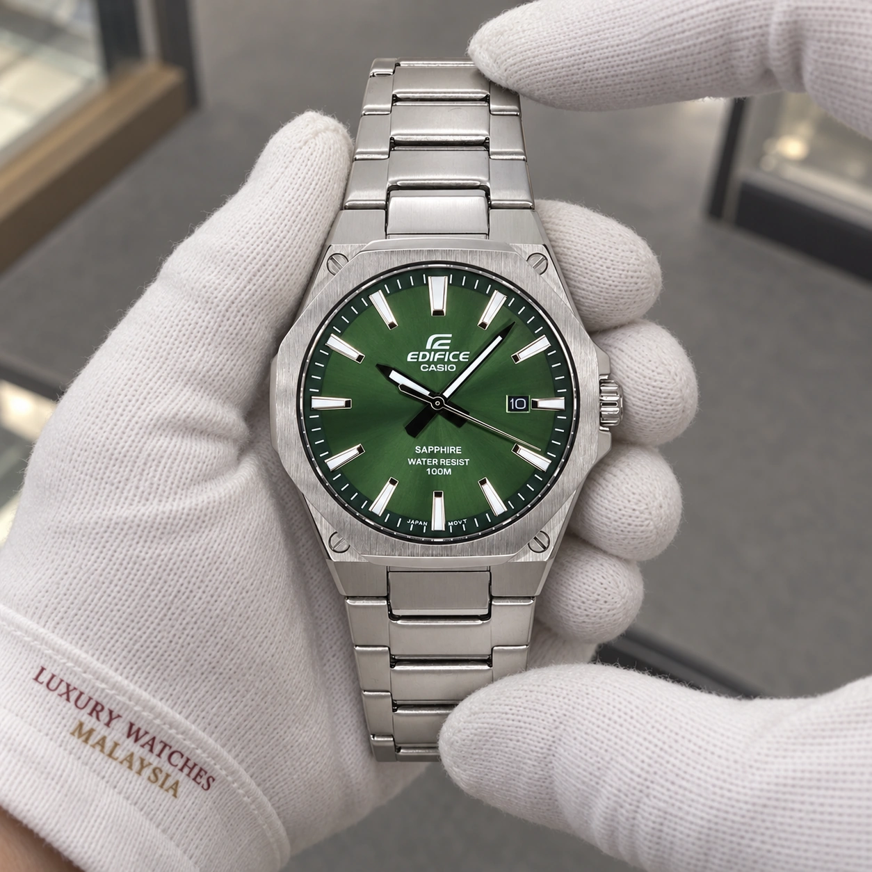 Casio EFR-S108D-3A presented in cotton gloves