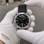 Casio MTP-1370L-1AVDF held in white cotton gloves with Luxury Watches Malaysia cuff mark