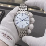 Citizen NH8350-59B held in white cotton gloves with Luxury Watches Malaysia cuff mark