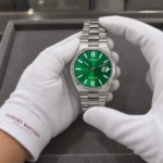 Citizen NJ0150-81X held in white cotton gloves with Luxury Watches Malaysia cuff mark