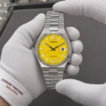 Citizen NJ0150-81Z held in white cotton gloves with Luxury Watches Malaysia cuff mark