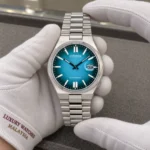 Citizen NJ0151-88X held in white cotton gloves with Luxury Watches Malaysia cuff mark