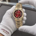 Citizen NJ0153-82X held in white cotton gloves with Luxury Watches Malaysia cuff mark