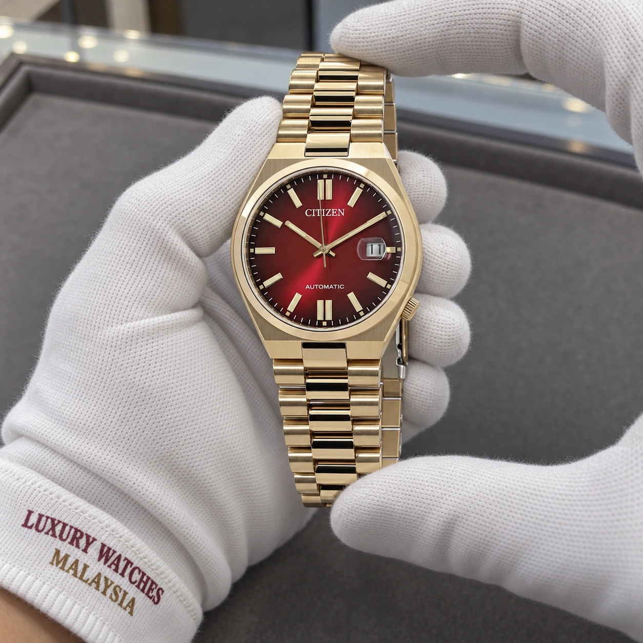 Citizen NJ0153-82X presented in cotton gloves