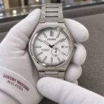 Citizen NJ0180-80A held in white cotton gloves with Luxury Watches Malaysia cuff mark