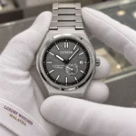 Citizen NJ0180-80H held in white cotton gloves with Luxury Watches Malaysia cuff mark