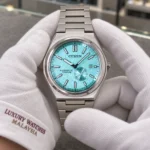Citizen NJ0180-80M held in white cotton gloves with Luxury Watches Malaysia cuff mark