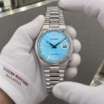 Citizen NJ0200-50L held in white cotton gloves with Luxury Watches Malaysia cuff mark