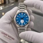 Citizen NK5010-51L held in white cotton gloves with Luxury Watches Malaysia cuff mark