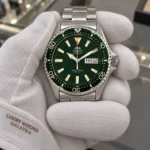 Orient RA-AA0004E19B held in white cotton gloves with Luxury Watches Malaysia cuff mark