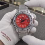 Orient RA-AC0N02Y10B held in white cotton gloves with Luxury Watches Malaysia cuff mark