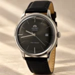 Orient Bambino FAC0000CA0 grey dial automatic watch with black leather strap, front studio view